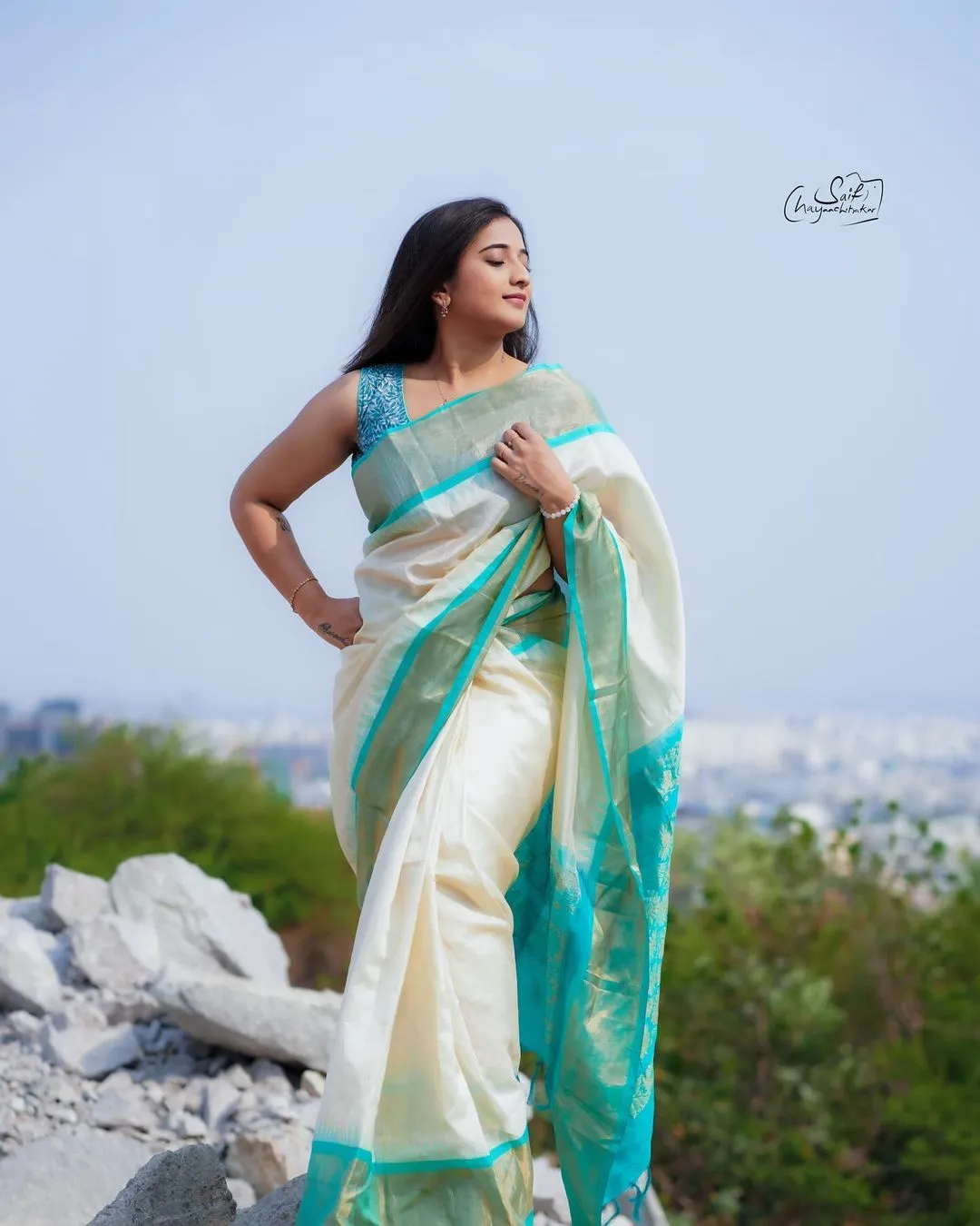 Beautiful Indian Actress Virajitha Stills in White Saree